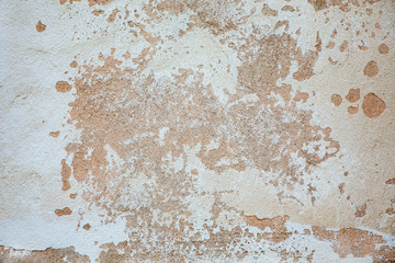 Texture of the old wall with peeling paint, plaster with cracks. Texture backround