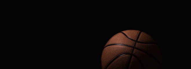 Closeup detail of basketball ball texture background. Team sport concept.  Sports modern banner