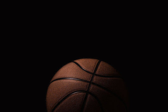 Closeup detail of basketball ball texture background. Team sport concept.  Sports modern banner