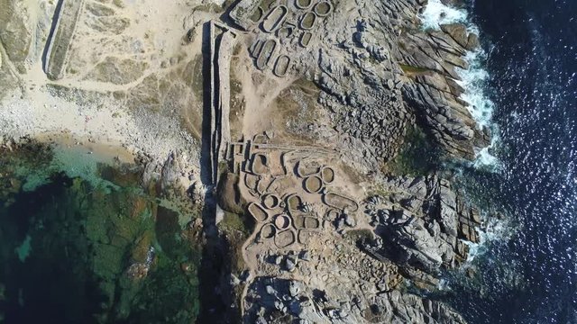 Celtic settlement of Castro de Baro&ntilde;a. Beach of Porto do Son, A Coru&ntilde;a. Galicia, Spain. Aerial Drone Footage