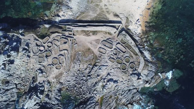 Celtic settlement of Castro de Baro&ntilde;a. Beach of Porto do Son, A Coru&ntilde;a. Galicia, Spain. Aerial Drone Footage