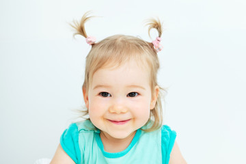 Portrait of a happy caucasian child at home