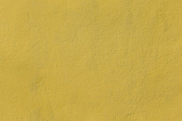 Yellow cement wall texture background for design in your work.