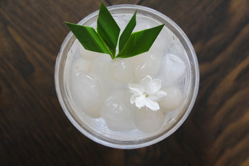 Corypha umbraculifera in syrup and ice in beautiful glass, thai dessert call looklarn loi keaw