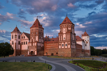Fototapeta na wymiar Belorussian tourist landmark attraction Mir Castle at sunset.