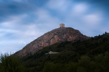 Fototapeta na wymiar defensive medieval watchtower on top of a hill