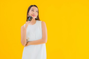 Portrait beautiful young asian woman with credit card