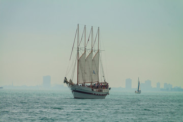 Fototapeta na wymiar The Tall Ship Sailing Lake Michigan With Chicago Skyline in the Distance, Chicago, Illinois, USA
