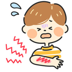 腕に擦り傷を負った男の子