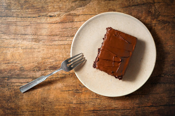 Slice of chocolate cake with chocolate frosting