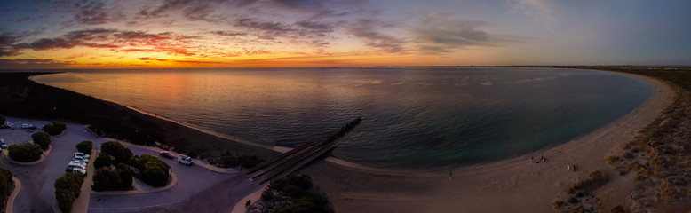 Arial sunset at Long Point Jetty with people fishing and swimming, Port Kennedy