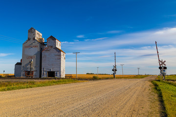 An old abandoned grain elevator in the town of Leney in the prairie province of Saskatchewan,...