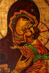 Fototapeta na wymiar Icon painted in the byzantine or orthodox style depicting the Virgin Mary and Jesus.