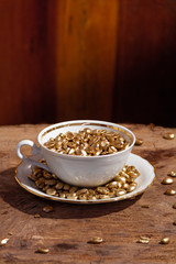 CUP WITH GOLDEN COFFEE GRANTS 13