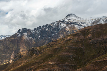 Dramatic Andes mountain range in the snow, Colca Canyon, Arequipa region, Peru