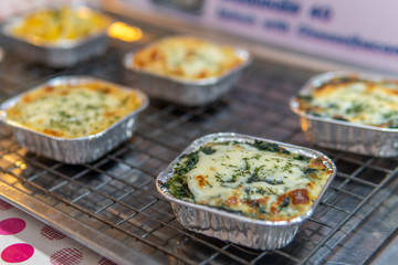 Baked lasagna in a metal dish