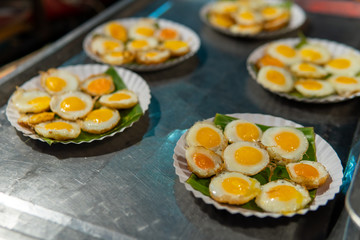 A plate of sunny side up quail eggs