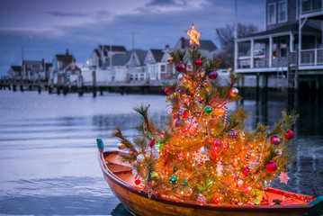 USA, Massachusetts, Nantucket Island. Nantucket Town, small dory with Christmas tree.