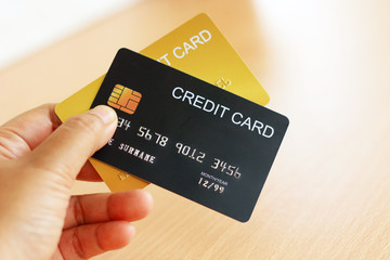 Shopping and payment concept. Close up of women hand holding credit cards. Shopping online with credit card.