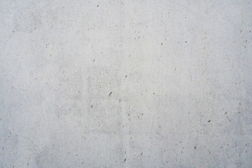 Texture of a smooth gray concrete wall as background or wallpaper. Close up of concrete wall with rough texture. Cement texture.