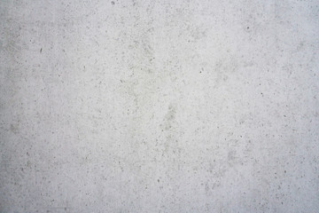 Texture of a smooth gray concrete wall as background or wallpaper. Close up of concrete wall with rough texture. Cement texture.
