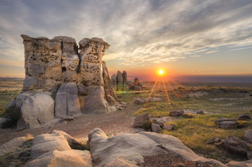 USA, Montana. Sunset over sandstone rock formations and prairie of Medicine Rocks State Park.