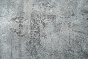 Texture of a smooth gray concrete wall as background or wallpaper. Close up of concrete wall with rough texture. Cement texture.