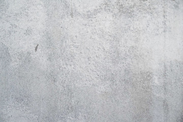 Texture of a smooth gray concrete wall as background or wallpaper. Close up of concrete wall with rough texture. Cement texture.