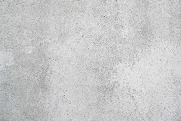 Texture of a smooth gray concrete wall as background or wallpaper. Close up of concrete wall with rough texture. Cement texture.