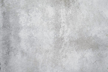 Obraz na płótnie Canvas Texture of a smooth gray concrete wall as background or wallpaper. Close up of concrete wall with rough texture. Cement texture.
