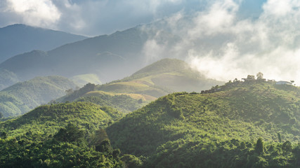 Misty and greenery mountain range at sunrise , Sapun Village, Nan, Thailand