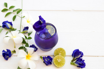 herbal healthy drinks  mix lemon and  flower butterfly pea purple cold cocktail water local flora...