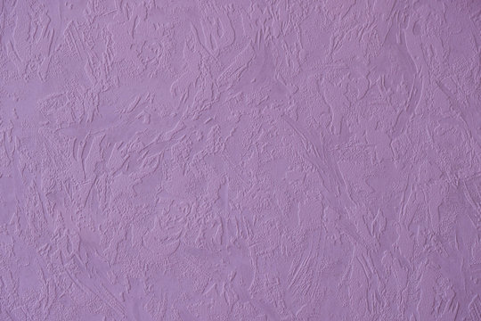 Textured purple wallpaper. Copy space.