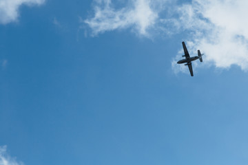 Airplane in the sky. Evacuation of people from countries. The risk of a pandemic.