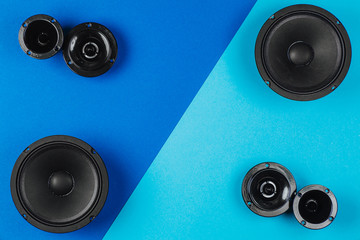 Car audio, car speakers, on a blue background.