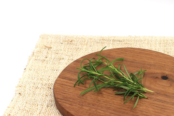 fresh rosemary on wooden board