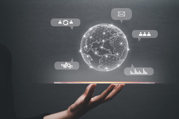 Communication technology and internet worldwide for business concept.Woman hand holding Business World.