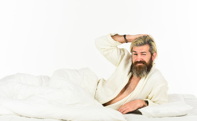 Obraz premium Relaxation techniques. Sleep is critical to your health and well being. Sleep disorders concept. Man bearded hipster having problems with sleep. Guy lying in bed try to relax and fall asleep