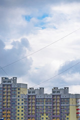 View of a multi-storey building through a network of communication cables