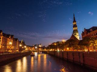 Hamburg City at night during summer time with golden colors