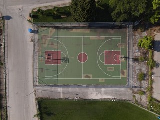 Aerial overhead drone photo of a basketball court in Choristi, Drama, Greece © Dimitris