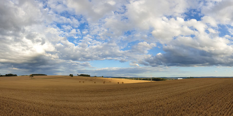 Fototapeta premium scenic panorama view of natural landscape under a cloudy sky