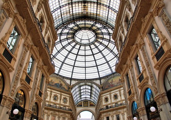 Panorama inside the Galleria Vittorio Emanuele II in Milan. This gallery is famous shopping mall...