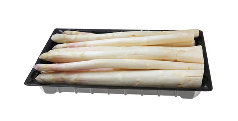 Fresh ripe asparagus in plastic pack isolated on white