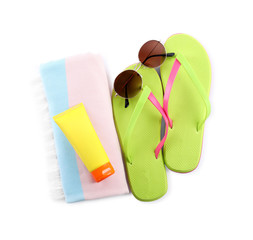 Composition with beach objects on white background, top view