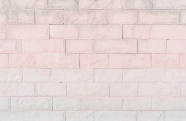 Empty Pink brick wall texture background in the bedroom at lovely. Brickwork stonework interior, rock old clean concrete grid uneven abstract weathered brick design, horizontal architecture wallpaper.