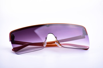 Sunglasses closeup on a white isolated background
