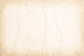 Obraz premium Brown recycled paper crumpled texture background. Cream Old vintage page or grunge vignette parchment old blank newspaper. Pattern empty rough cardboard creased grunge surface backdrop with space.