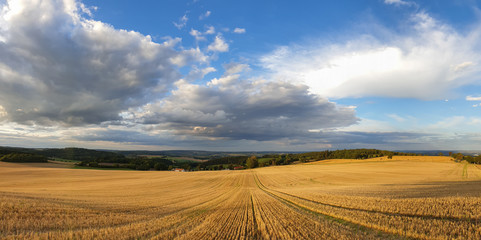 scenic panorama view of natural landscape under a cloudy sky