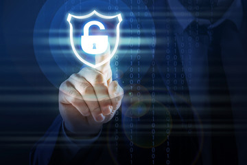 Cyber security concept. Man using virtual screen with padlock illustration, closeup